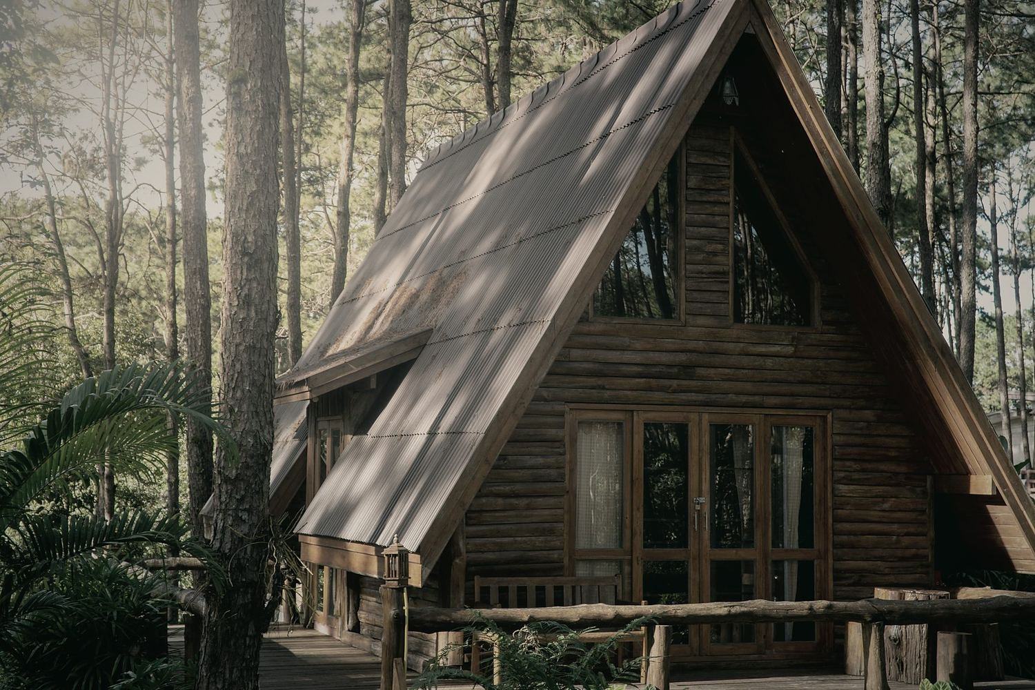 A timber lodge among tall trees